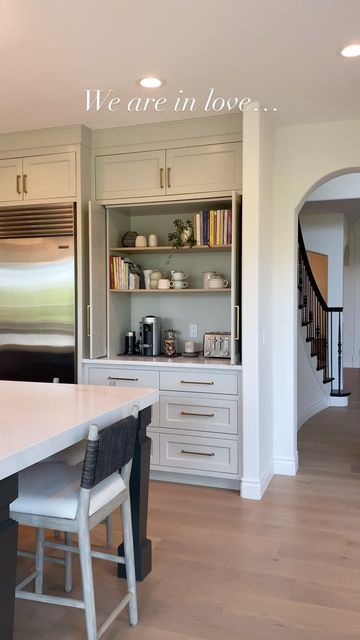 ᴏᴀᴋ ʜᴇᴀʀᴛʜ ʜᴏᴍᴇs on Instagram: "We are definitely in love.. 😍🤩 How could you not be in love with this hidden coffee pantry set up? Doors open or doors closed this area of the kitchen is a stand out. Doors closed you can hide appliances and deciliter your counter or keep things from guests you won’t want them to see! Doors open to a beautifully set up coffee bar with tons of storage and space for decor that can make your kitchen look even more elegant 🙌🏼 What do you think of this cabinet feat Pantry Cabinet Microwave, Kitchen Cabinet On Top Of Counter, Upper Cabinet Sitting On Countertop, Kitchen Appliance Pantry, Coffee Bar Hidden Cabinet, Coffee In Pantry, Kitchen Cabinet Around Refrigerator, Hidden Pantry Next To Fridge, Hide Coffee Maker In Kitchen