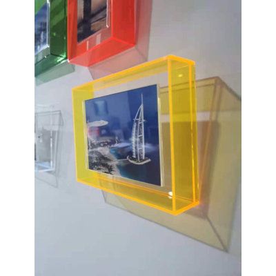 Wall-mounted photo frame deco We designed the acrylic frame with a coloured frame outside and transparent back with magnets connected with a bent acrylic photo holder and hanging holes for screws in order to hang on the wall. Colour: Neon/Yellow Acrylic Photo Wall, Plexi Art, Colored Plexiglass, Corporate Signage, Wall Signage, Acrylic Signage, Wall Colour, Acrylic Frame, Photography Exhibition