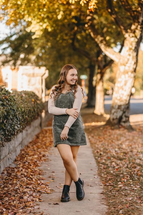 Middle School Photoshoot Ideas, Old Downtown Photoshoot, Senior Picture Ideas Cold Weather, Senior Girl Posing Ideas Fall, Senior Picture Books, Senior Picture Ideas Main Street, Girl Senior Portraits Outfits, Graduation Pictures Downtown, Girl Senior Session Downtown