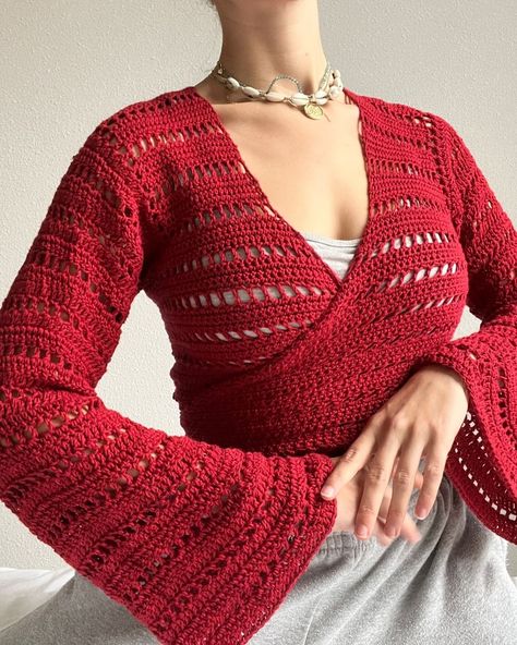 Julia | My red Island wrap top! This one is made with increases on the sleeve the create a bell sleeve effect! #crochetersofinstagram… | Instagram Crochet Bell Sleeve Wrap Top, Crochet Elegant Cardigan, Crochet Sweater Flare Sleeves, Elegant Crochet Top, Crochet Wrap Around Top, Crochet Tops Free Patterns Long Sleeve, Crochet Tops With Sleeves, Red Yarn Crochet Ideas, Crochet Wrap Top Pattern Free