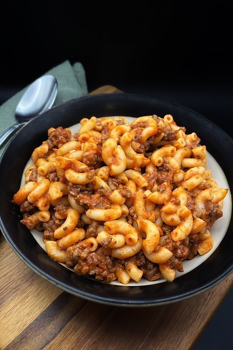 This goulash recipe is truly a classic American comfort food! A hearty pasta dish made with ground beef and a rich tomato-based sauce. It all comes together in about 30 minutes. My family loves it! The Best Goulash, Best Goulash, Best Goulash Recipes, American Comfort Food, Goulash Recipe, Harvest Kitchen, Goulash Recipes, Tomato Pasta, Cheese Pasta