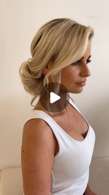 Side Part Updo Wedding Low Buns, Center Part Updo Wedding, Behind One Ear Hairstyle, Side Buns For Wedding, Side Part Wedding Updo, Low Bun Face Framing Pieces, Low Bun With Volume On Top, Low Side Bun Updo, Romantic Messy Updo