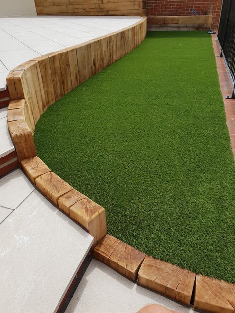 Curved Sleeper Wall, Curved Garden Edging, Astro Turf Garden Ideas, Astro Turf Garden, Sleeper Wall, Sleeper Retaining Wall, Sleepers In Garden, Modern Gardening, Florida Project