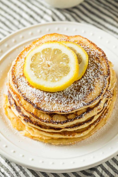 This lemon ricotta pancake recipe by Bobby Flay features common pantry items like all-purpose flour, ricotta cheese, eggs, and fresh lemon. With a prep time Ricotta Pancakes Recipe, Fluffy Lemon Ricotta Pancakes, Lemon Ricotta Pancakes Recipe, Italian Breakfast Recipes, Fluffy Pancake Recipe, Lemon Ricotta Pancakes, Better Breakfast, Baking Measurements, Italian Breakfast