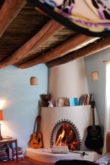 dream kiva~ via cage free family. Adobe Fireplace, Fireplace Construction, Pueblo Revival, Kiva Fireplace, Adobe House, Wood Branch, Santa Fe Style, Cob House, Wooden Gates