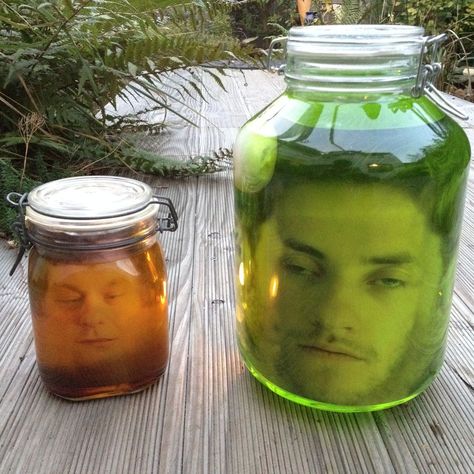 This is so cool!  It takes photo editing software to get the photo to look 3D, but it looks easy and very realistic! Faces In Jars For Halloween, Head In Jar Diy, Face In A Jar Halloween, Heads In Jars Halloween, Face In Jar Halloween, Head In Jar Halloween, Head In A Jar Halloween, Eyeballs In A Jar, Halloween Decor Aesthetic