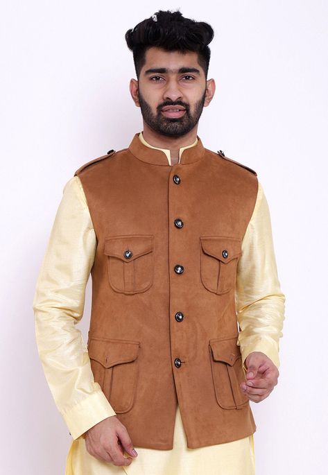 Readymade Suede Pathani Jacket in Brown This Collar Neck and Sleeveless Piece with Satin Lining is Allured with Buttons and Box Pleated Flap Pocket Do note: Top, Bottom and Footwear shown in the image is for presentation purposes only. Half to one inch may vary in measurement. (Slight variation in actual color vs. image is possible) Half Jacket For Men, Rajputana Dress, Punjabi Kurta Pajama Men, Best Wedding Suits For Men, Mens Kurta Pajama, Nehru Jacket For Men, Best Wedding Suits, Indian Jackets, Mens Indian Wear