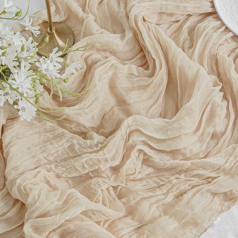 PRICES MAY VARY. Gauze [Package] You will get 1 Pcs, 35W"x120"L(10FT) beige cheesecloth table runner. Each 10FT long is perfect for 3-4FT long table. [Soft Material] Beige cheesecloth table runner is made of high quality polyester, soft to the touch and the cheesecloth fabric make the table runner sheer enough to sway in the wind. It is completely wrinkle free and not easy to fade, not shrink thus reusable. [Elegant Table] The ivory cheesecloth table runner with gorgeous finished edges drapes gr Communion Table Decorations, Communion Centerpieces, Communion Table, Party Cake Table, Cheesecloth Table Runner, Rustic Table Runners, Boho Table Runner, Cake Table Decorations, Fabric Table Runner