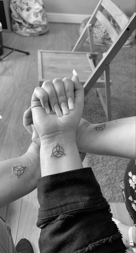 Three Sibling Tattoos Symbols, Tatoos Three Friends, Three Sister Matching Tattoos, Sibilant Tattoos, Three Hands Holding Tattoo, Three Generations Of Women Tattoo, Small Matching Tattoos For 4 People, Small Tattoos Trio, 3sister Tattoos