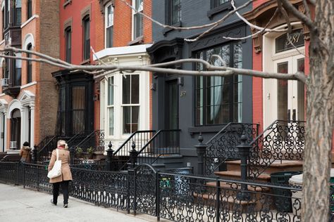 The outside of the home is painted in a bold, beautiful, matte black. Row Home, Clever Kitchen Storage, Brooklyn Brownstone, Park Slope, Home Exterior, Face Lift, House Paint Exterior, Take A Walk, House Tour