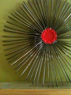 How to make a recycled plastic knife starburst wreath · Recycled Crafts | CraftGossip.com Plastic Spoon Crafts, Plastic Knife, Craft Christmas Gifts, Silverware Art, Creative Wreaths, Spoon Crafts, Plastic Silverware, Plastic Utensils, Nail Polish Storage