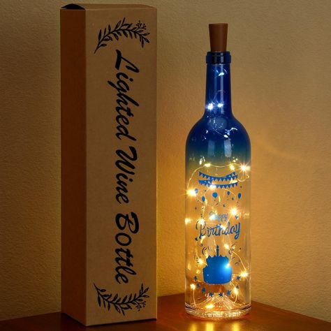 PRICES MAY VARY. Lighted Wine Bottle Set: you will receive 1 piece of wine bottle, 1 piece of kraft paper box, 1 piece of string lights, nice combination to meet your decoration or gift sending needs, great additions to celebrate birthday Reliable Material: the decorative wine bottle adopts quality glass material, with fine craftsmanship, clearly printed and hard to fade, not easy to break or deform, easy to clean, which can accompany you for a long time Decorative Lights: the wine bottle lights Glass Liquor Bottle Crafts, Recycled Wine Bottle Art, Wine Bottle Lights, Small Lights, Liquor Bottle Crafts, Birthday Lights, Mini String Lights, Celebrate Birthday, Light Up Bottles