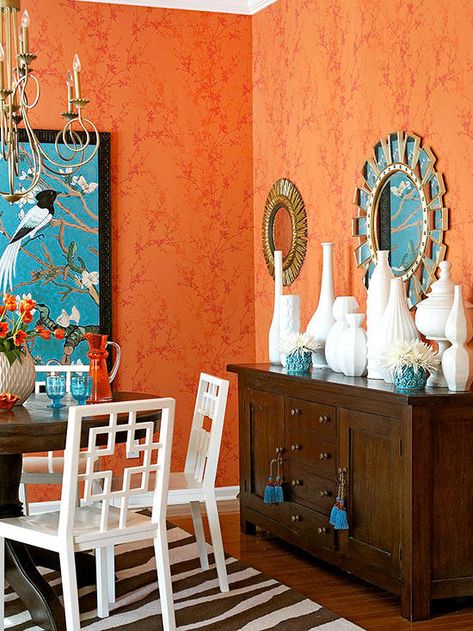 Find your favorite mood with some of these orange color schemes. #colorschemes #orange Orange Bedside Table, Orange Dining Room, Taupe Walls, Orange Rooms, Orange Color Schemes, Iron Bed Frame, Living Room Orange, Bedroom Orange, Painted Chest