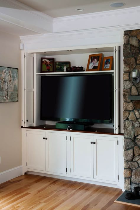 Folding doors to hide TV Hide Tv In Cabinet, Tv Cabinet With Hidden Door, Tv Doors Hide Tv, Hide Tv Cabinet, Hidden Tv Bedroom, Tv Cabinets With Doors, Hidden Tv Cabinet, Built In Tv Cabinet, Tv Cupboard