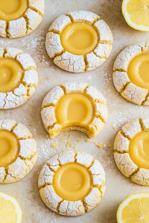 Easy Lemon Curd Thumbprint Cookies - Emma's Cake Studio Lemon Curd Thumbprint Cookies Recipe, Lemon Cookies With Lemon Curd, Lemon Thumbprint Cookies Recipe, Lemon Curd Crinkle Cookies, Lemon Curd Thumbprint Cookies, Fresh Lemon Desserts, Lemon Curd Recipe Desserts, Lemon Curd Cookies Recipe, Thumbprint Cookies Christmas