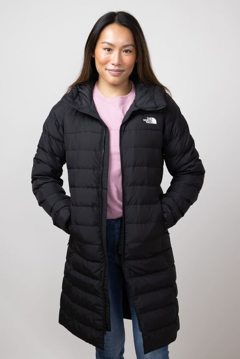 The North Face Aconcagua Parka for Women in Black offers a stylish look that is friendly to the environment but tough on the cold. This quilted parka works to protect you from cold weather and rainy days. Features: The North Face Style: NF0A88TA-JK3 Color: Black 100% recycled polyester Women’s Parka Jacket Adjustable three-piece hood with a cinch-cord and cord lock on back Full center front zip with an internal draft flap to block the elements Secure-zip handwarmer pockets for when you forget your gloves or need to store your essentials Elastic-bound cuffs fit to your wrists to keep the heat in Zoned sheet insulation helps keep you warm, even in wet weather Heat transfer logo on left chest and back-right shoulder Wind-resistant WindWall Fabric Non-PFC DWR finish on overlay adds water repel Women’s Winter Jackets, Black North Face Puffer Jacket, Black North Face Puffer, The North Face Rain Jacket, Face Style, North Face Puffer Jacket, North Face Rain Jacket, Quilted Parka, Women In Black