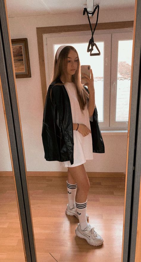 White headband black leather jacket white dress oversised tee adidas socks nike shoes Adidas Socks Outfit Street Style, Adidas Socks Outfit Woman, High Nike Socks Outfit, Black Nike Socks Outfit, High Socks Outfits Sneakers, Leather Jacket White Dress, Adidas Socks Outfit, Socks Outfit Sneakers, Long Socks Outfit