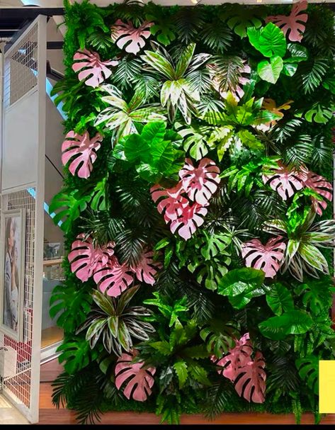 Colorful Miami Backyard makeover | foliage wall | leaf wall | pink monstera | easy garden update | colorful back yard Tropical Grass Wall Backdrop, Tropical Grass Wall, Artificial Wall Plants Decor, Artificial Plant Wall Indoor, Diy Selfie Wall, Faux Grass Wall, Faux Plant Wall, Tropical Flower Wall, Content Corner