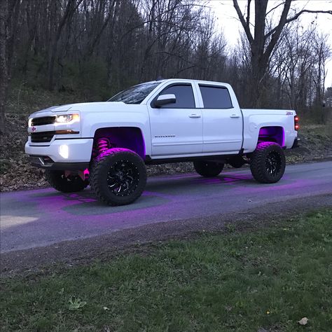 2016 Chevy Silverado 1500 pink rock lights Truck Chevy Silverado, Jacked Up Chevy Silverado, Lifted Chevy Trucks 1500, Trucks With Led Lights, Pink Chevy Trucks, Chevy Trucks Lifted, 2016 Chevy Silverado 1500, 2016 Silverado 1500, 2016 Chevy Silverado