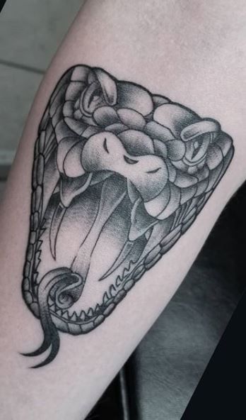 75 Trendy Snake Tattoos Designs, Ideas and Meanings - Tattoo Me Now Snake Head On Hand Tattoo, Snake Tattoo On Neck Men, Snake On Knee Tattoo, Snake Face Tattoo Design, Snake Hissing Tattoo, Snake Tattoo Head, Snake Mouth Tattoo, Snake Head Tattoo Design, Snake Knee Tattoo