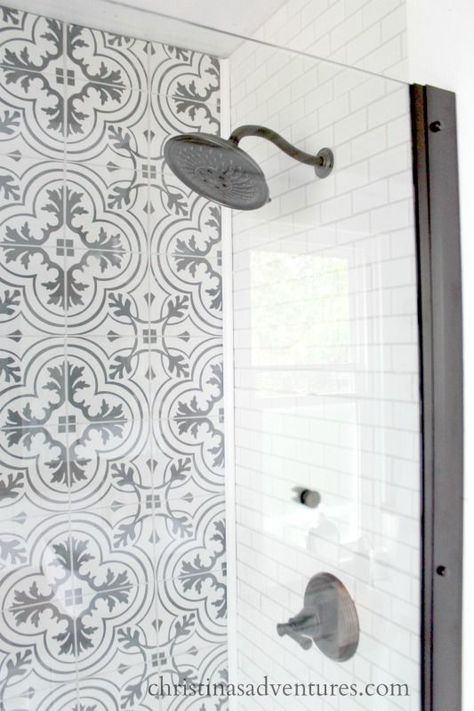 black and white patterned tile walk in shower with a gooseneck rain shower head and subway tile Black And White Patterned Tile, Tile Walk In Shower, Patterned Bathroom Tiles, Patterned Tile, Walk In Shower Designs, Master Bath Remodel, Downstairs Bathroom, Bathroom Update, Glass Shower Doors