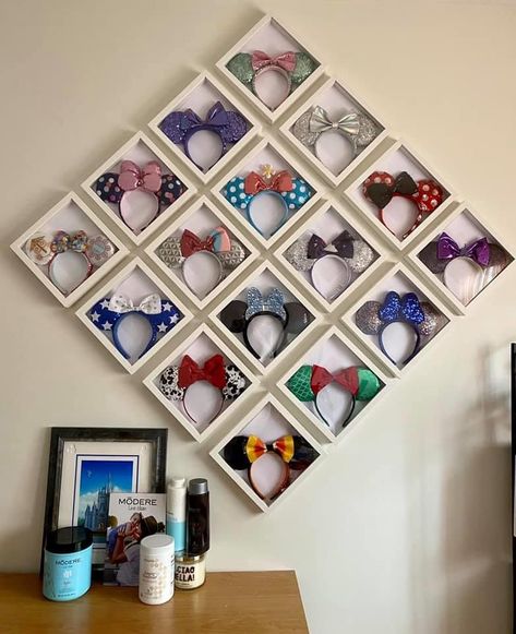 Disney Furniture Home Decor, Wall E Disney Ears, Displaying Mickey Ears On Wall, Disney Ear Display Wall, Disney Picture Display Ideas, Displaying Disney Ears, Disney Movie Room Ideas, Displaying Mickey Ears, Disney Home Decor Diy Craft Ideas