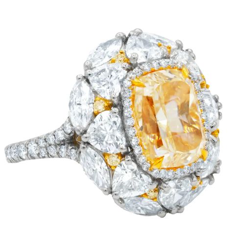 GIA Certified 5.01 Carats Canary Yellow Diamond Ring For Sale at 1stDibs | 8 carat canary diamond ring Canary Diamond Ring, Canary Yellow Diamonds, Orange Diamond, Yellow Diamond Ring, Canary Diamond, Yellow Diamond Rings, Fancy Yellow Diamond, Bracelets Design, Hand Accessories