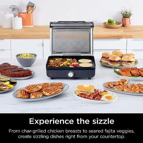 From char grilled strip steaks to sizzling fajita veggies, unlock delicious flavors any time of the day using the interchangeable grill and griddle plates. Reach temperatures of up to 500°F for high heat grilling and searing and get better char grilled marks right from your kitchen. No hot spots. No cold spots. Just even, edge to edge heating. The perforated mesh lid eliminates smoke from your kitchen and reduces splatter, and the plates are equipped with high walls and grease catches. Parrilla Interior, Fajita Veggies, Chargrilled Chicken, Strip Steaks, Fajita Vegetables, Flat Top Griddle, Tender Chicken Breast, Indoor Grill, Grill Plate