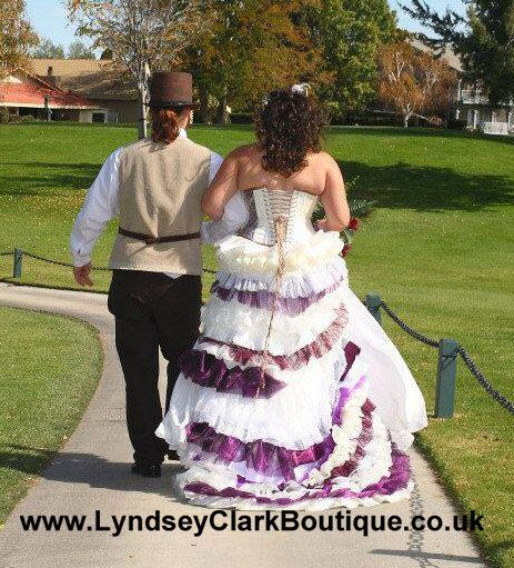 Steampunk wedding dress ivory purple with Train / Bustle custom MADE TO ORDER/ measure by LyndseyBoutique on Etsy https://www.etsy.com/listing/159423302/steampunk-wedding-dress-ivory-purple Wedding Garments, Wedding Dresses Ball Gown Princess, Blue Couple, Steampunk Wedding Dress, Dresses Flowy, Spring Wedding Guest Dress, Train Wedding, Dresses Romantic, Dresses Princess