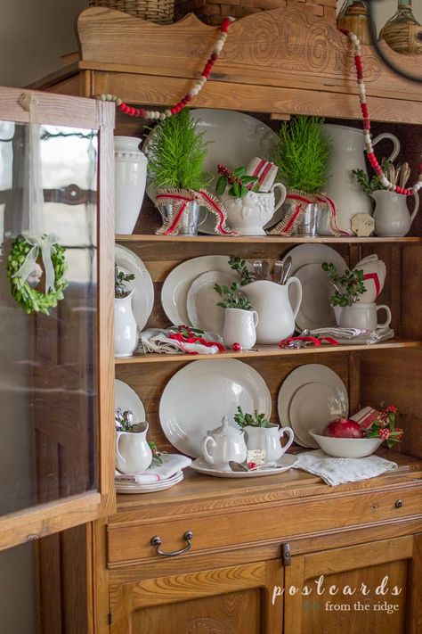 21 Ways to Use Vintage Items in Your Christmas Decor - Postcards from the Ridge Kitchen Hutches, Antique Hutch, Hutch Decor, Christmas Dining Room, Farmhouse Christmas Decor, Christmas Kitchen, Christmas House, Holiday Home Decor, Country Christmas