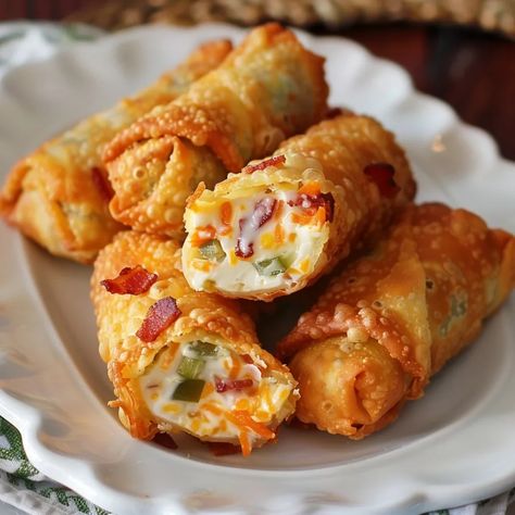 Mini Jalapeno Popper Egg Rolls: crispy, cheesy, spicy bites. Easy recipe, health benefits & perfect for parties or game days! Best Orderves Party Appetizers, Game Day Egg Rolls, Spicy Jalapeño Egg Rolls, Bacon Jalapeno Poppers Eggrolls, Jalepeno Wonton Popper, Egg Roll Wrapper Recipes Baked, Mini Egg Rolls Appetizers, Bacon Jalepeno Popper Egg Roll, Potluck Appetizer Recipes