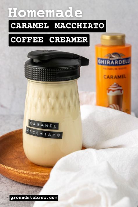 Jar of homemade caramel macchiato coffee creamer and a bottle of Ghirardelli caramel sauce in the background. Salted Caramel Coffee Creamer Recipe, Homemade Creamer Caramel, Coffee Creamer Recipes Homemade, Healthy Caramel Coffee Creamer, Homemade Coffee Creamer With Honey, Homemade Flavored Coffee Creamer Recipe, Diy Coffee Creamer Caramel, Recipes For Coffee Creamers, Diy Coffee Creamers