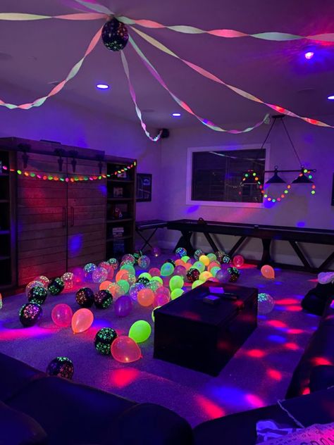 Glow Crazy For This Party Idea Glow In The Dark Streamers, Neon Garden Party, Rave Decorations Party, Glow Bar Party, Glow Party Ideas Outfits, Birthday Places To Go, Neon Photo Wall, Bday Party Theme Ideas, Rave Birthday Party Ideas