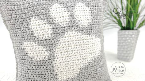 Crochet Paw Print Pillow Pattern | The Crochet Crowd Paw Print Crochet Pattern, Crochet Cushion Cover Pattern, Paw Print Crochet, Crochet Paw Print, Crochet Pillow Covers, Paw Print Pillow, Pillow Cover Crochet, Pillow Cover Crochet Pattern, Crochet Home Decor Patterns