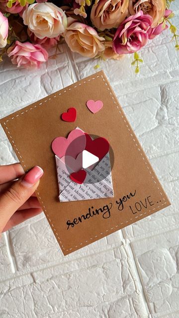 HANDMADE GIFTS AND SCRAPBOOK on Instagram: "Sending you LOVE❤️🫰🏻  Measurements: Brown sheet: 11*14cm Printed white sheet: 7*7cm Hearts: can be made in different sizes❣️  [Tip: take the base card sheet a little thick, preferably 300gsm]  Follow @handcrafted.shop for more such videos  Want more such videos?" Cute Cards To Make For Your Girlfriend, Cute Diy Cards For Girlfriend, Birthday Scrapbook Ideas For Boyfriend Handmade Cards, Birthday Gift For Boyfriend Diy, I Love You Cards For Him Handmade, I Love You Card Ideas, Aesthetic Cards Ideas Handmade, Diy Gift Card For Boyfriend, Sending Love Card