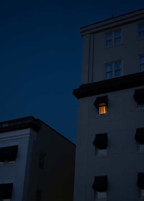 Building Lights At Night Aesthetic, Lit Windows At Night, Building With One Light On At Night, Low Light Landscape Photography, Window At Night Aesthetic, Light Window Aesthetic, Low Lighting Aesthetic, Building Windows At Night, Dark Building Aesthetic