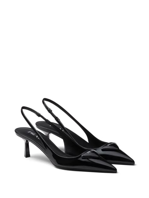 logo-plaque slingback pumps Prada's slingback pumps honour the Italian brand's minimalist design sensibility. Set on a mid heel, this black brushed-leather pair is solely decorated with the house's iconic triangle logo. Designer Sling Back Heels, Prada Stilettos, Prada Kitten Heels, Black Pointed Heels, Prada Triangle, Prada Shoes Heels, Heels Designer, Pointed Shoes, Shoes Hack