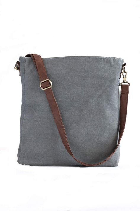 PRICES MAY VARY. A slightly smaller but just as mighty version of the maika Recycled Canvas Crossbody Bag in easygoing recycled canvas (8.5” x 11” x 3”) Features a zippered top, an interior zip pocket, an easy-to-clean waterproof lining and a vegan leather strap and hook for clipping on keys or a maika Recycled Canvas Travel Pouch Vegan leather detachable strap can be adjusted up to 44” Use a damp soft cloth to spot clean canvas exterior as needed; gently wipe down vegan leather handles and trim Modern Crossbody Bags At Affordable Prices, Cheap Soft Leather Bags For Everyday Use, Cheap Leather Bags With Pockets, Classic Cheap Bag With Zipper Pocket, Modern Cheap Satchel With Zipper Pocket, Affordable Classic Shoulder Bag With Zipper Pocket, Cheap Classic Bag With Zipper Pocket, Cheap Classic Shoulder Bag With Zipper Pocket, Cheap Urban Shoulder Bag For Everyday Use