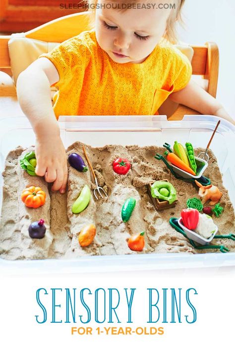 Looking for easy, DIY sensory bins for 1 year old kids? Take a look at these bin ideas for toddlers to get their hands on! Diy Farm Sensory Bin, Sensory Bin Ideas For One Year Olds, Pompom Sensory Bins, Sensory Bins For 12 Month Olds, Sensory Bins For 16 Month Old, Sensory Bin For 2 Year, Sensory Play For 2 Yo, Farm Sensory Bin Toddlers, Sensory Bin For 20 Month Old