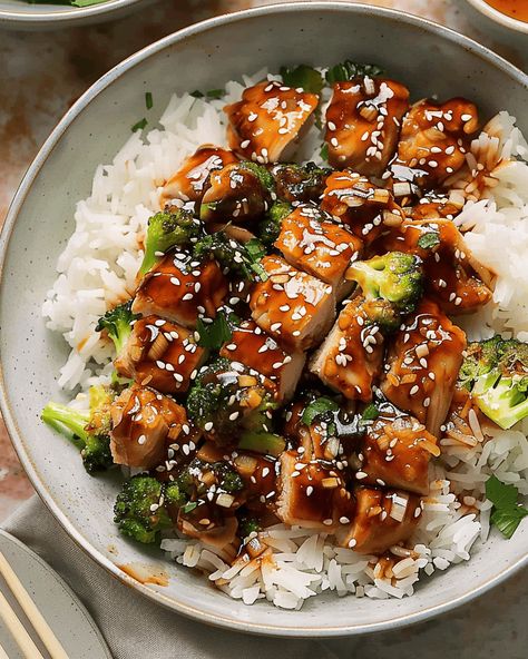 Sticky Chicken Rice Bowls: A Flavorful and Satisfying Meal in Just 30 Minutes If you’re looking for a quick and delicious dinner that hits all the right notes, these Sticky ... Read more Easy Chicken Bowls, Sticky Chicken Rice Bowl, Chicken And Rice Asian, Sticky Rice Bowl, Rice Bowl Ideas, Asian Rice Bowls, Chicken And Rice Bowl, Teriyaki Chicken Bowl, Chicken Rice Bowl