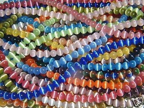 Beading Crafts, Cats Eye, Eye Beads, Bead Store, Diy Stuff, Evil Eye Charm, Bead Shop, Fiber Optic, Faceted Glass