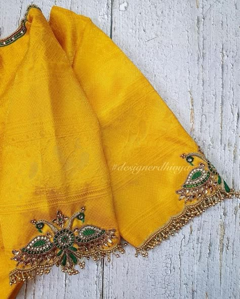 Simple Aari Work Blouse Design Yellow, Simple And Unique Aari Work Blouse Design, Gold Color Maggam Work Blouse, Elegant Aari Work Designs, Kundan Hand Embroidery, Silk Saree Blouse Designs With Work, Kundan Blouse Work, Sleeve Border Aari Work, Kundan Maggam Work Blouses