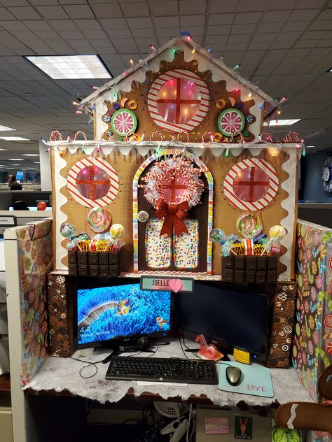 Christmas Cubicle/Desk Decoration. I made this DIY Gingerbread House with lots of cardboard, paper, paint, and Dollar Tree finds :)  #office #christmasdecor #holidaydesk #gingerbreaddesk #christmasdesk #christmas #xmas #winter #deskdecorations #diy #artsandcrafts #crafts #homemade #artist #art #candy #candyland #Christmascubicle #holidaycubicle #cubicle #desk #dollartree #michaels #gingerbread #gingerbreadman #gingerbreadhouse #gumdrops #lollipops #gummybears #wreath #chocolate #chocolates Gingerbread House Work Cubicle, Ginger Bread House Desk, Candy Land Cubicle Ideas, Desk Gingerbread House, Christmas Decorations For Work Desk, Gingerbread Desk Decorations, Desk Decorating Christmas, Gingerbread House Desk Decorations, Gingerbread Office Cubicle