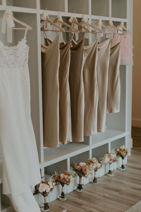 Bride And Bridesmaid Dresses Hanging, Bridesmaid Dresses Hanging Picture Ideas, Bridesmaid Dresses Hanging, Champagne Satin Bridesmaid Dresses, Champagne Wedding Theme, Bridal Suite Room, Summer Wedding Flowers Centerpieces, Champagne Wedding Themes, Bridesmaid Dress Hangers