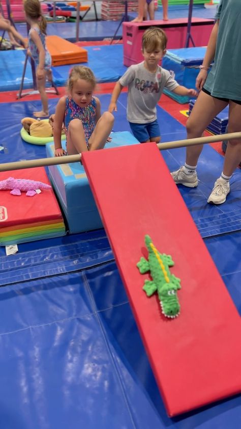 Preschool Gymnastics Ideas | #WayBackWednesday to a few years ago with a kid approved fave in preschool and summer camp. So so fun for forward rolls and this one also... | Instagram Preschool Gymnastics Stations, Preschool Gymnastics Ideas, Preschool Gym, Gymnastics Ideas, Toddler Gymnastics, Preschool Gymnastics, Carrot Dogs, Kids Gymnastics, Bar Station