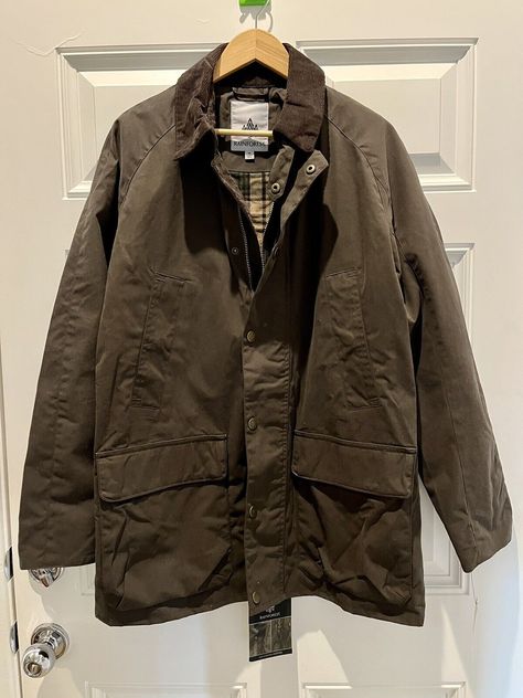 This Rainforest parka jacket is a must-have for any fashion-savvy man. With its Barbour-style design, it's perfect for both casual and formal occasions. Made with waxed cotton outer shell. It's brand new with tags and sized medium for a perfect fit. The brown color is versatile, making it great for any outfit. The quality on this coat is really nice. Please feel free to go on the Rainforest website, this jacket is the Explorer and the color is portobello. Pit to pit measures 21 inches. Sleeve measures 26 inches. Collar to bottom measures 32.5 inches. This elegant jacket seems to be designed for layering. Yellowstone Style, Flowy Fashion, Barbour Style, Carhartt Detroit Jacket, Detroit Jacket, Carhartt Detroit, Waxed Cotton Jacket, Elegant Jacket, Outwear Women