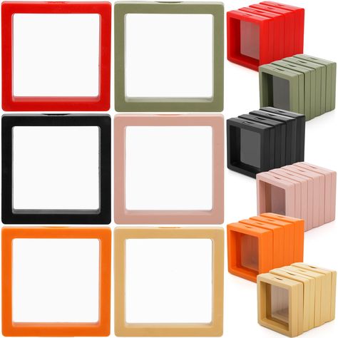 PRICES MAY VARY. Package: 30pcs plastic floating frame display holders. It is made of plastic frame, durable PET membranes. Lightweight and easy to arrange. Suitable for kinds of small items. Dimensions: square frame size: 2.7" L x 2.7" W, Display screen size: 2.2" x 2.2". These display cases will display your valuable small items clearly and safely. 6 color single display boxes. Offer kinds of choice to display your items, and can choose suitable colors for your items. Simple set up, these squa Challenge Coin Display, Unique Framing, Frame 3d, Apartment Goals, Art Fairs, Coin Display, Toy Display, Medal Display, Display Cases