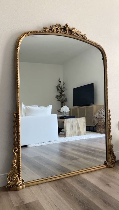 anthropologie mirror, gold mirror, modern organic living room, home interior, aesthetic apartment Contemporary Apartment Living Room, Home Interior Aesthetic, Gleaming Primrose Mirror, Primrose Mirror, Anthropologie Mirror, Organic Living Room, Aesthetic Apartment, Contemporary Apartment, Dreamy Room