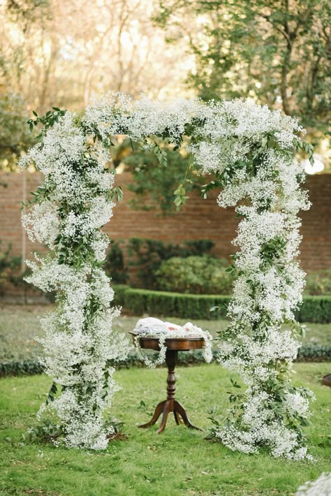 Wedding ceremony arch, wedding ceremony flowers.  Babies breath flower arch.   Houston Wedding Planning:  Something to Celebrate | Houston Event Venue:  The Cohen House| Wedding Photography:  Agape House Studio| Floral:  Last Petal | Lighting & Reception Music:  Bradley David Entertainment | Cake:  Cakes by Gina | Dessert:  Marini’s | Hair/Makeup:  Your Beautiful Face | Music (ceremony & cocktail hour):  Show Business Entertainment | Decor Rentals:  House of Hough & Elegant Beginnings Gypsophila Wedding Arch, Baby's Breath Wedding Arch, Wedding Arch Baby Breath, Baby Breath Arch Wedding, Babies Breath Wedding Arch, Gypsophila Arch, Baby Breath Arch, Babies Breath Arch, Babies Breath Wedding