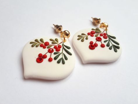 Dangle Christmas Clay Earrings, Christmas Polymer Clay Earrings, Christmas Clay Jewelry, Unique handmade Christmas gift for women, Mom gift These are unique, handmade, polymer clay earrings with winter flower motifs with Swarowski crystal. These beautiful earrings are pieces of original and unique artwork. The method is known as 'appliqued technique'. Using tiny pieces of clays and a sharp needle. I don't use molds to prepare my jewelry.  Each small parts of the motifs are made by hand and place Winter Polymer Clay Earrings, Christmas Earings, Clay Christmas Earrings, Christmas Clay Earrings, Clay Earrings Christmas, Cercei Din Lut Polimeric, Christmas Polymer Clay, Pasta Fria, Christmas Mistletoe